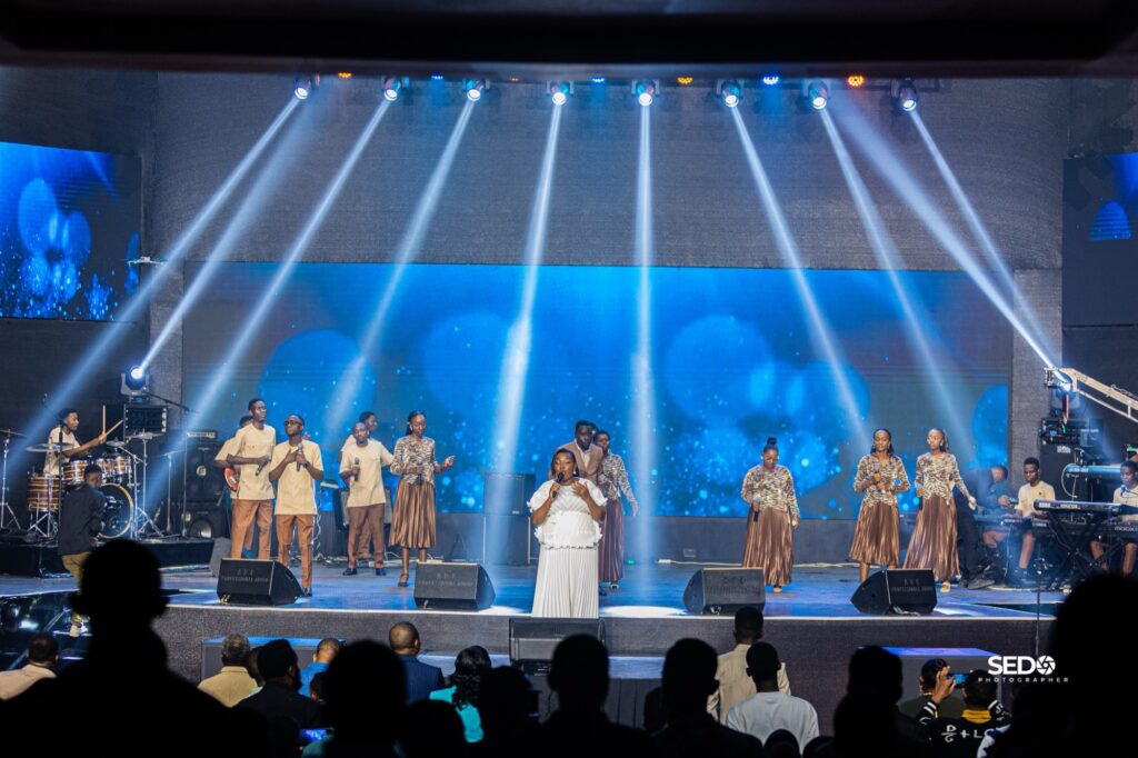 Encounter Worship team on stage under blue lights at Power Encounter